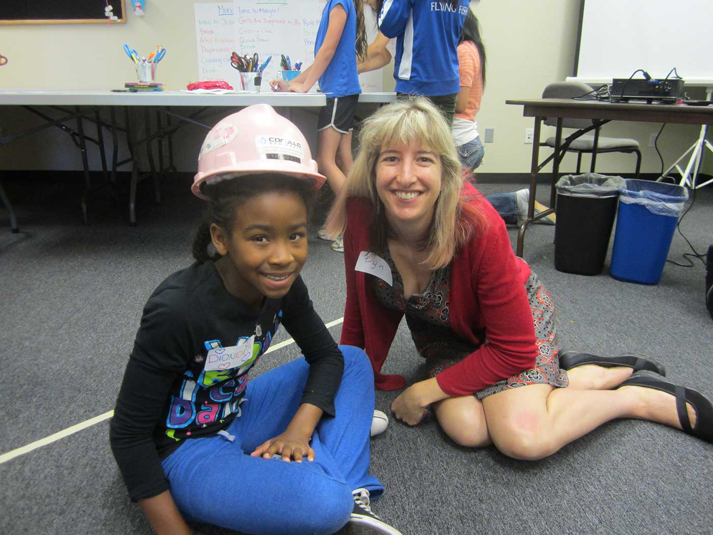 student and teacher in classrom