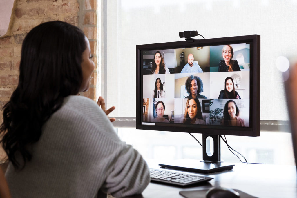 Multi-ethnic team has meeting via video conference