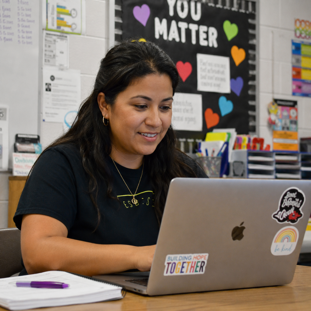 Teacher on the computer doing training
