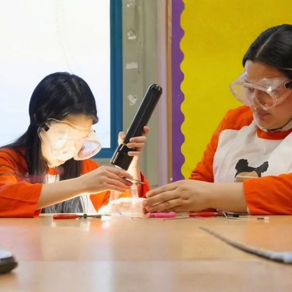 YOUNG GIRL DOING AN EXPERIMENT